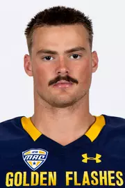 Headshot of a Kent State football player wearing a navy blue jersey with 'Golden Flashes' text in gold letters