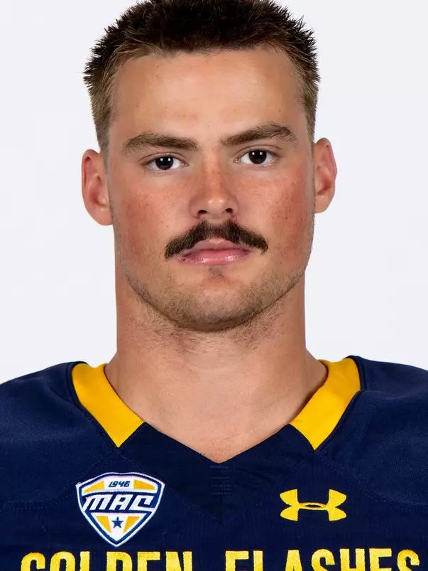 Headshot of a Kent State football player wearing a navy blue jersey with 'Golden Flashes' text in gold letters