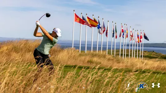 Veronika Kedronova tees off at an international golf tournament with country flags in the background
