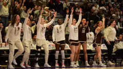 WBB team bench shot from PL Championship game at Holy Cross