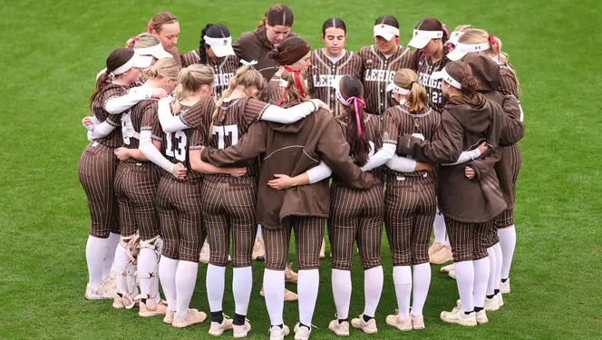 Softball team huddle NC State