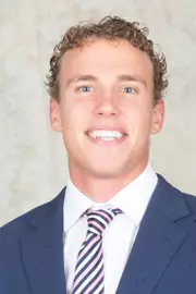 Ryan Metz headshot 26-27