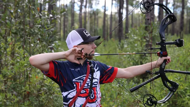 Lynch (’18) brings engineering mind, gift for teaching to helm of archery program