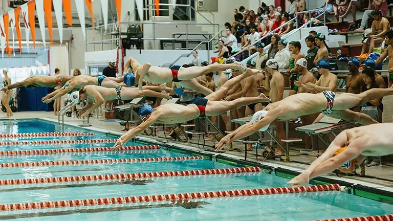 Men’s swimmers leave competitors in their wakes at NC State