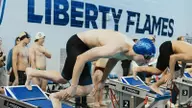 Flames swimmers leave Eastern Regional competition high and dry, win fourth straight title