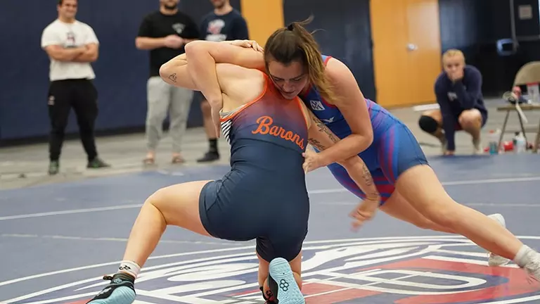 Lady Flames severely challenged in home quad meet with NAIA, NCAA Division III opponents