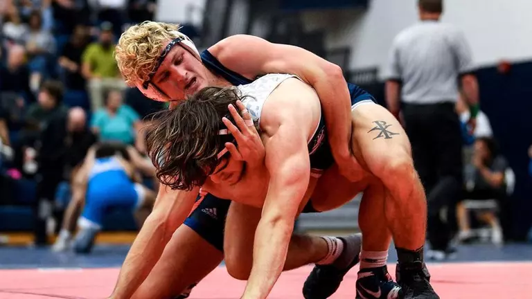 Men’s wrestlers nab two fourth-place finishes at Messiah Invite