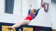 Gymnasts send seniors out by edging JMU in Flippin’ Flames home meet