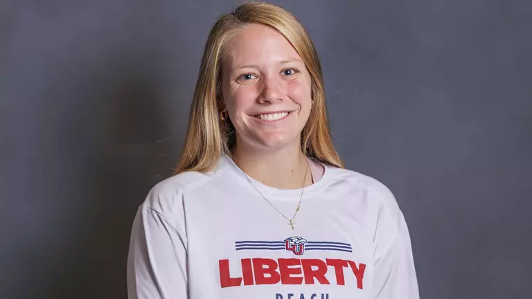 Former Lady Flame Payton Carter named head women’s beach volleyball coach