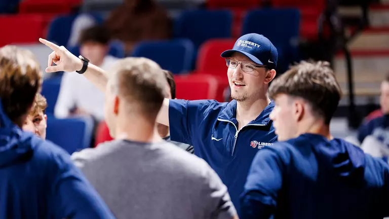 Men’s volleyball swept by UVA in season opener at Liberty Arena