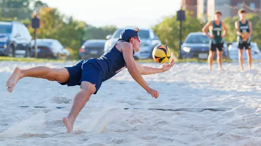 Men's beach volleyball dive