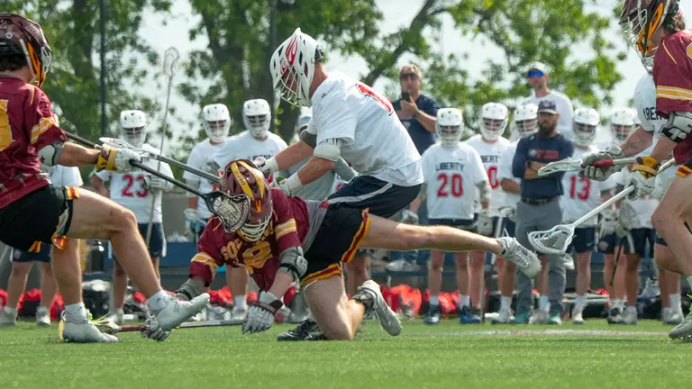 Flames men’s lacrosse grounds Gophers in MCLA Division I nationals opener, 21-8