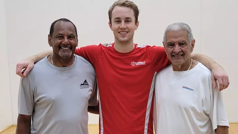 Flames graduate Melton takes Rodriguez’s place at helm of racquetball team