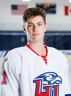 Luke Munroe from the Men’s D1 Hockey had his headshot taken in the Lahaye Ice Center on August 27, 2025. (Photo by Simon Barbre)