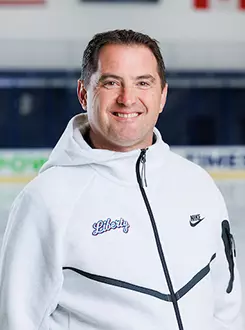 Head Coach Kirk Handy from the Men’s D1 Hockey had his headshot taken in the Lahaye Ice Center on August 27, 2025. (Photo by Simon Barbre)