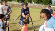 Serving with purpose: Flames lacrosse players pour hearts into Pan-Am Sixes Cup in Puerto Rico