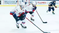 No. 1 Lady Flames fend off No. 2 Warriors in WMCH Showcase, winning 4-3 in OT