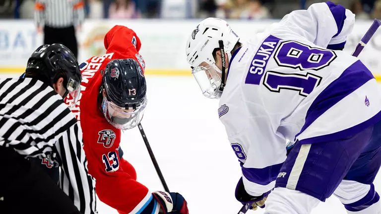 Power-play goal late in second period pushes Purple Eagles past Flames in spring opener
