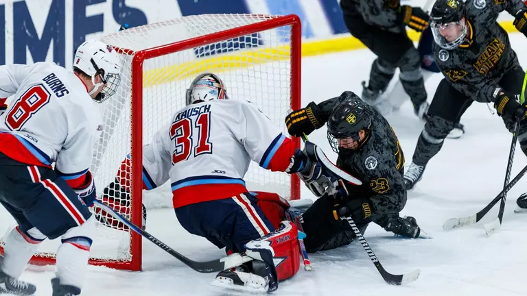 Late surge by Bulldogs snuffs Flames in overtime for fifth straight setback