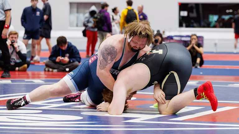 Men's wrestlers overtake Builders, Panthers to win MAC Tournament crown