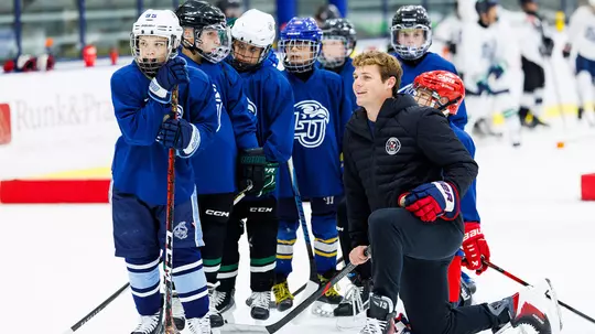 Liberty Hockey Camps counselor on ice