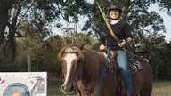 Alumni Spotlight: Scalzo blends passions for archery, riding