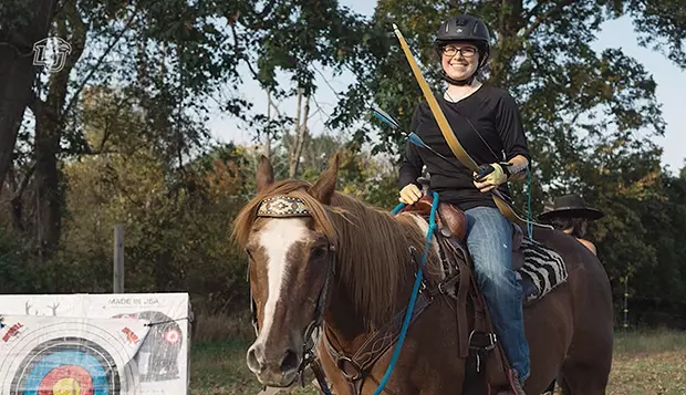 Alumni Spotlight: Scalzo blends passions for archery, riding