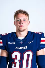 Liberty football media day on white backdrop June 27, 2024 (photo by: Emma Kendrick)