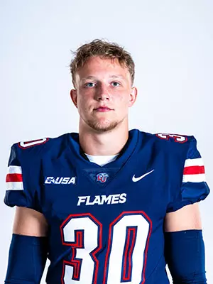 Liberty football media day on white backdrop June 27, 2024 (photo by: Emma Kendrick)