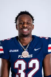 Liberty football media day on white backdrop June 28, 2024 (photo by: Emma Kendrick)