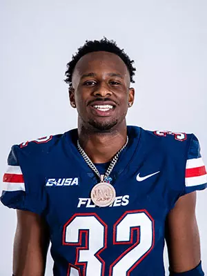 Liberty football media day on white backdrop June 28, 2024 (photo by: Emma Kendrick)