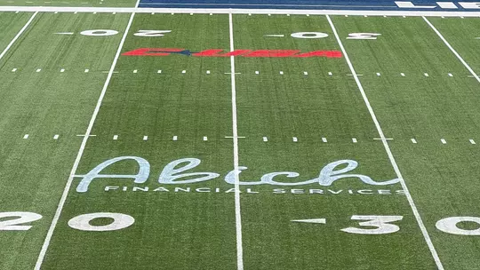 Football Abich Financial Logo on Williams Stadium playing surface - Press Release Announcement in 2026
