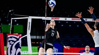 Brooklyn Fuchs attacking a ball at the net.