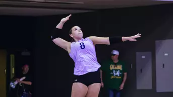 Kenzie Kucks serving
