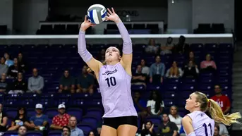 Kelsey Schenck setting up an assist