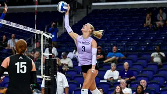 Sydney Strenger getting ready to spike a volleyball