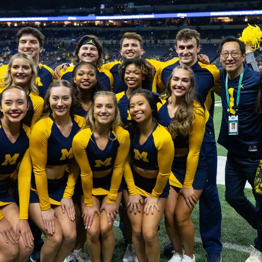 Cheer team with President Santa Ono