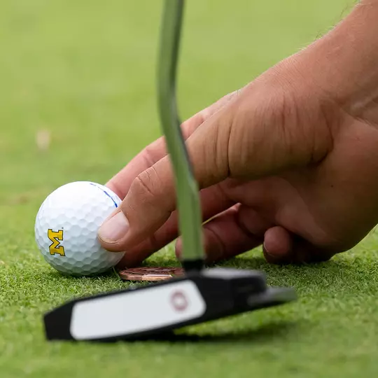 Men's Golf Marking a Ball