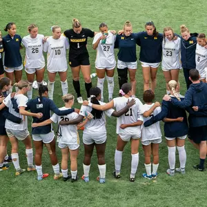 Women's Soccer Team Huddle