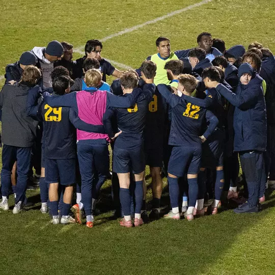 Men's Soccer Team Huddle