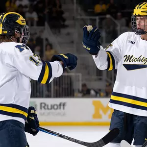 T.J. Hughes, left, and Will Horcoff