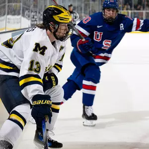 T.J. Hughes (13) and Drew Schock