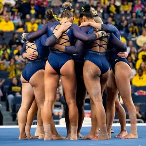 Women's Gymnastics Team Huddle