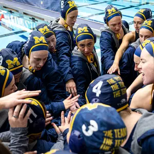 Michigan Water Polo huddle