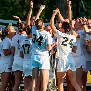 Women's Lacrosse Bench Celebration