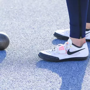 Track and Field Shot Put and Shoes