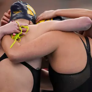 Women's Swimming and Diving Group Huddle