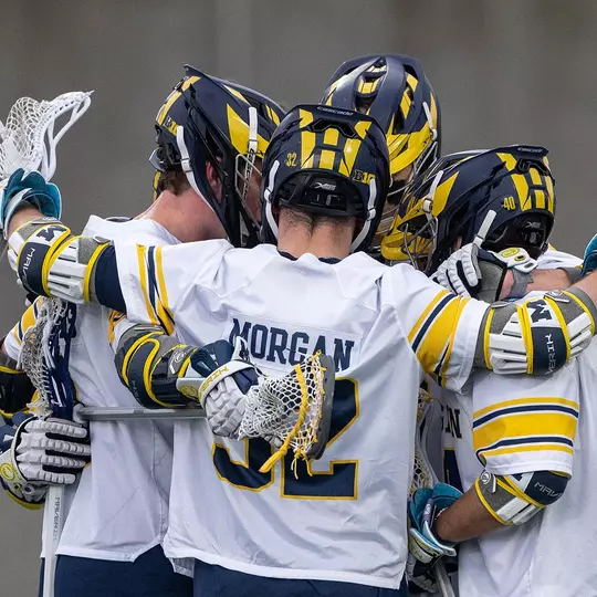 Men's lacrosse team huddle