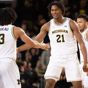 Elliot Cadeau, left, and Morez Johnson Jr.