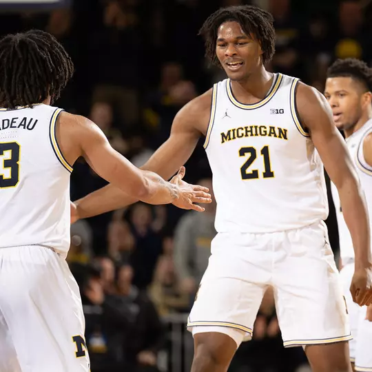 Elliot Cadeau, left, and Morez Johnson Jr.